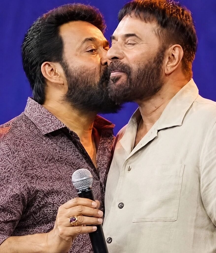 Mahanlaal gives Mautty a welcome kiss