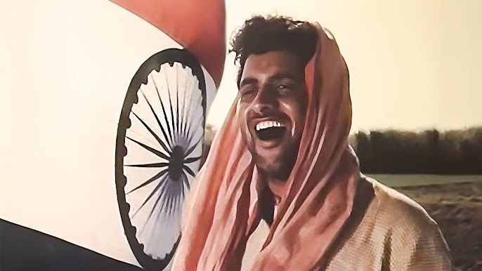 Manoj Kumar as Bharat in film Upkar with Indian flag